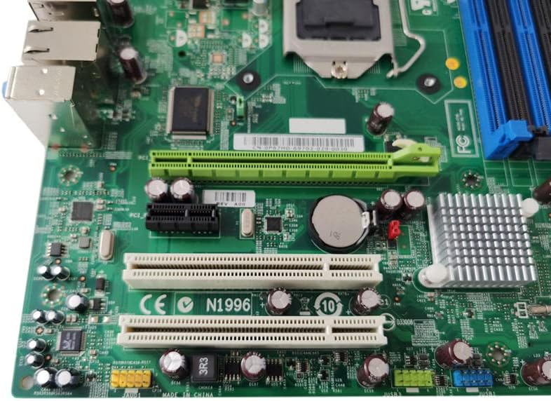 Close-up view of the motherboard's rear I/O panel, showing USB ports, Ethernet port, audio jacks, and a VGA port.