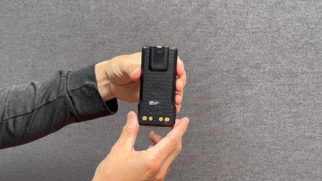 Motorola PMNN4544A battery being charged in an IMPRES charger