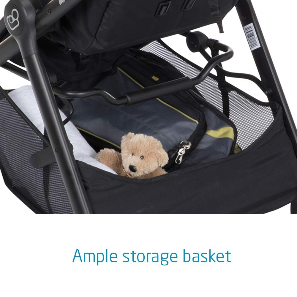 Close-up of the Maxi-Cosi Zelia stroller's ample storage basket, containing a teddy bear and a bag.