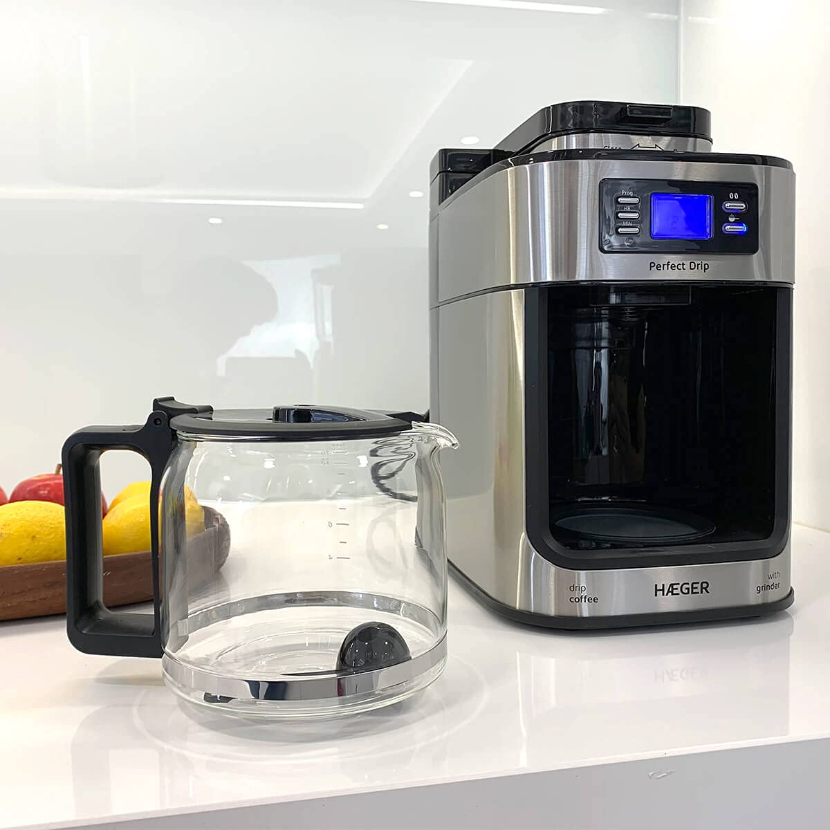 HAEGER Drip - Cafetera de Goteo automática con Molinillo, 1050W, Capacidad: 1,2L - Plato calentado para Mantener Caliente, Capacidad de Molino: 60g, Pantalla LCD, Temporizador de 24 Horas