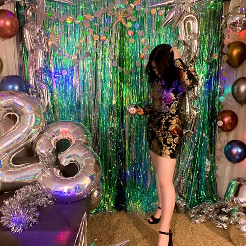Image of PartyWoo Green Streamers Backdrop 2pcs 3.3x6.6 ft Green Tinsel Foil Fringe Streamer Curtains Photo Backdrop for Graduation Birthday Wedding Dinosaur Jungle Golf Football Theme Party Decorations