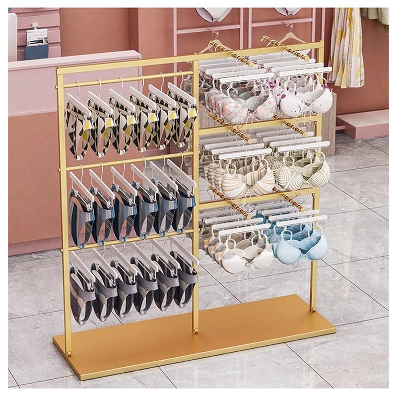 Organizador de ropa blanco para dormitorios modernos y boutiques de moda actual