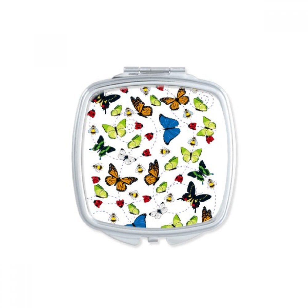 Miroir compact papillon avec double réflexion pour maquillage précis