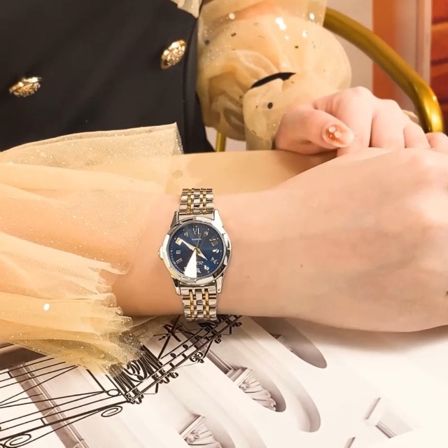 34mm rolex on woman's wrist