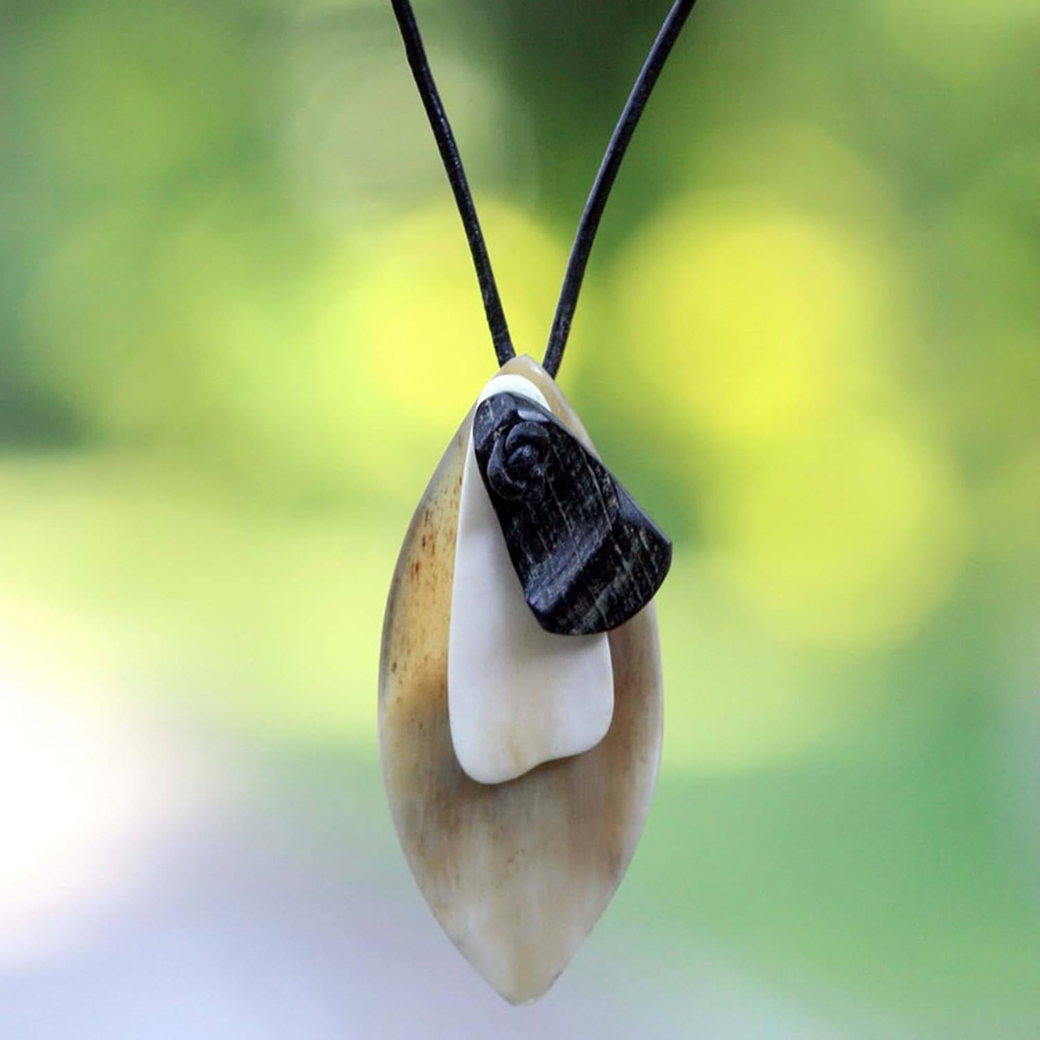 NOVICA Artisan Handmade Leather Pendant Necklace Artisan Crafted Men's Horn Bone Cord Sustainableupcycled Indonesia [15.75 in min L x 31.5 in max L 2 mm W Pendant(s) 3.3 in L x 1.4 in W] '