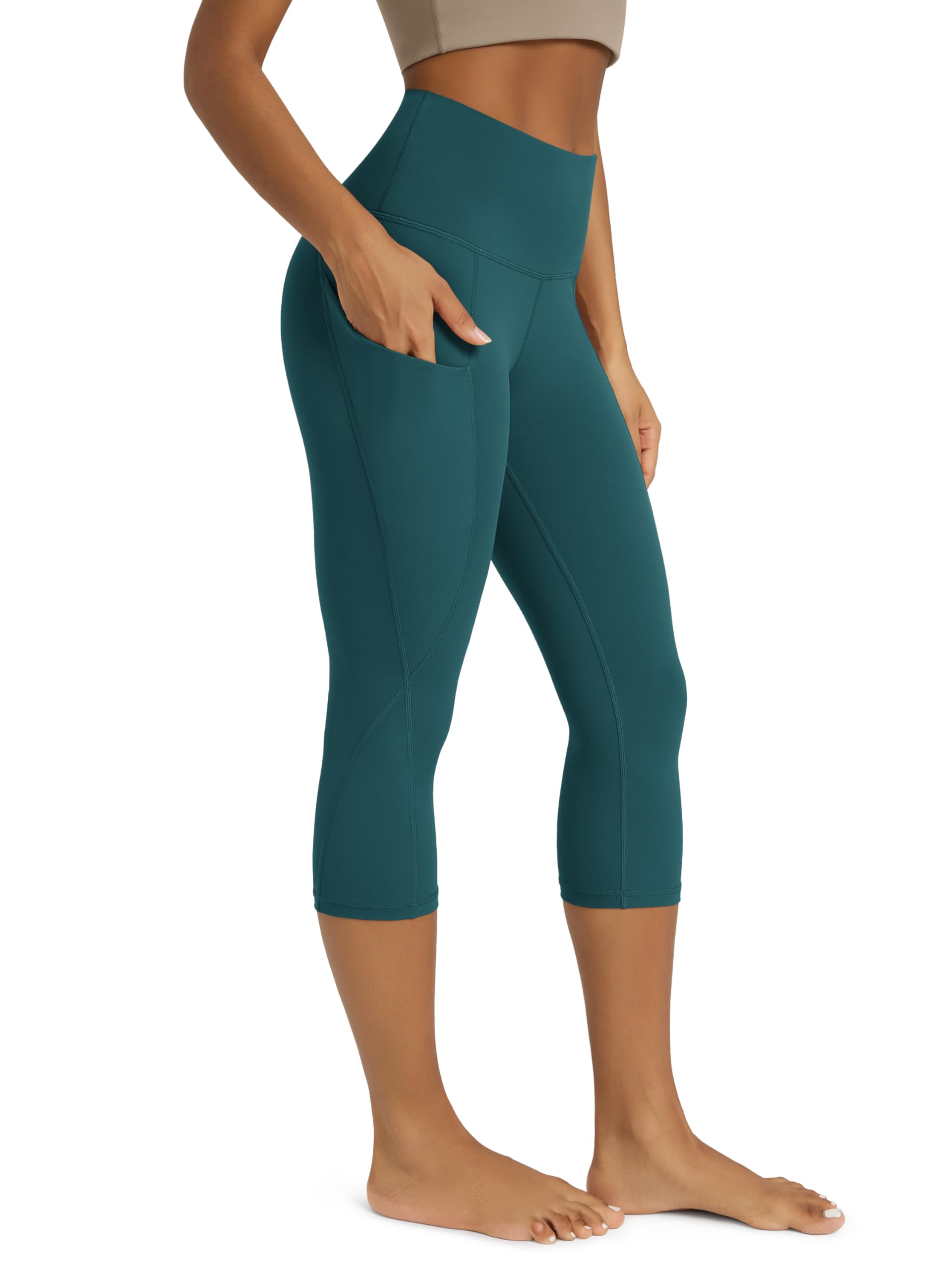 ODODOS Women's High Waisted Yoga Capris with Pockets, Tummy Control Non See Through Workout Athletic Running Capri Leggings