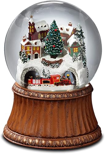 THE SAN FRANCISCO MUSIC BOX COMPANY Bola de nieve de cristal, con maqueta de tren giratorio y ciudad en la montaña.