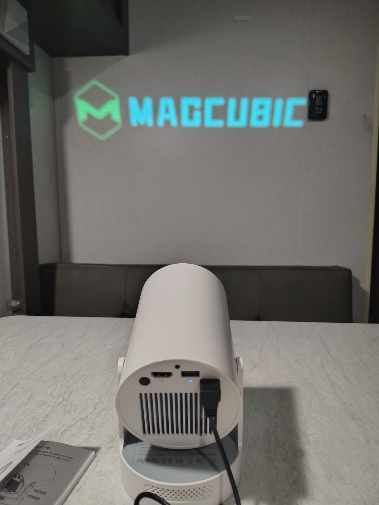 Magcubic projecting onto wall showing projection quality