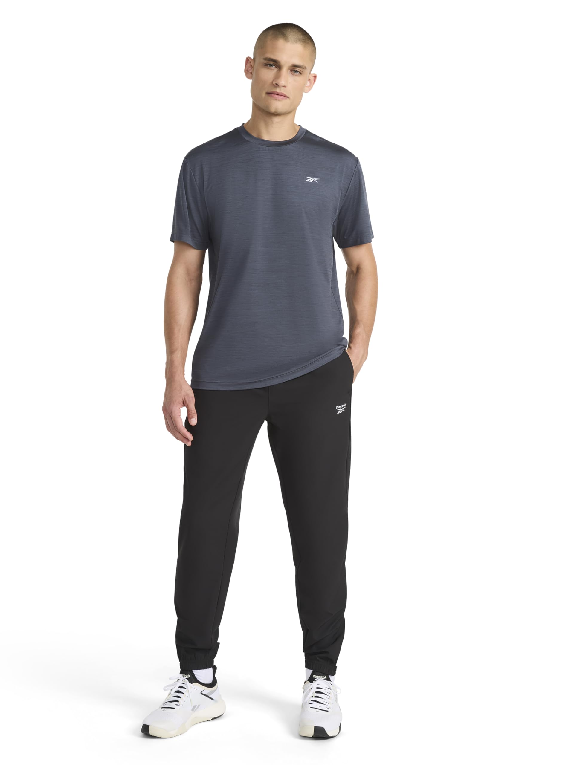 Reebok Herren Hose Repeat Woven Pant, Standard Fit, 30” Inseam, Lightweight Stretch Poly-Blend Fabric