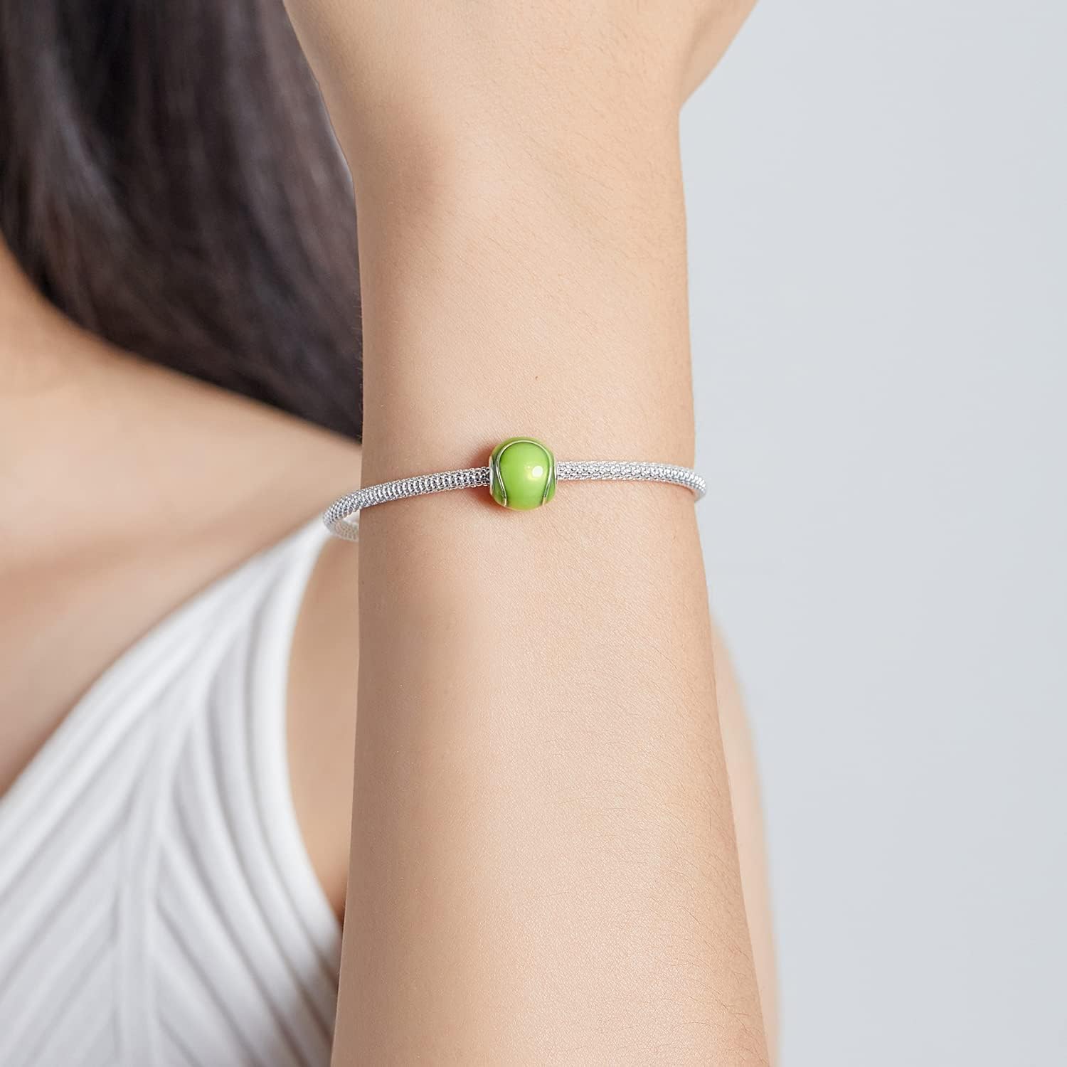Charm de pelota de tenis en plata de ley 925, ideal para pulseras.