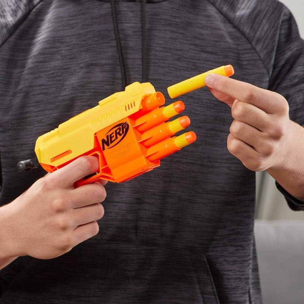 A hand inserting a yellow Nerf dart into one of the orange barrels of the Nerf Alpha Strike Fang QS-4 Blaster.