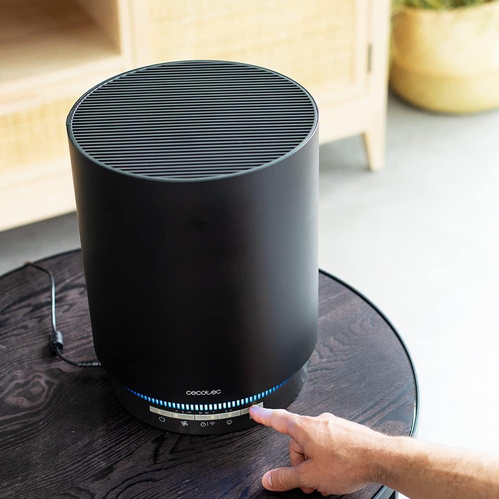 Cecotec TotalPure Connected 7500 Air Purifier in use, showing the illuminated control panel.