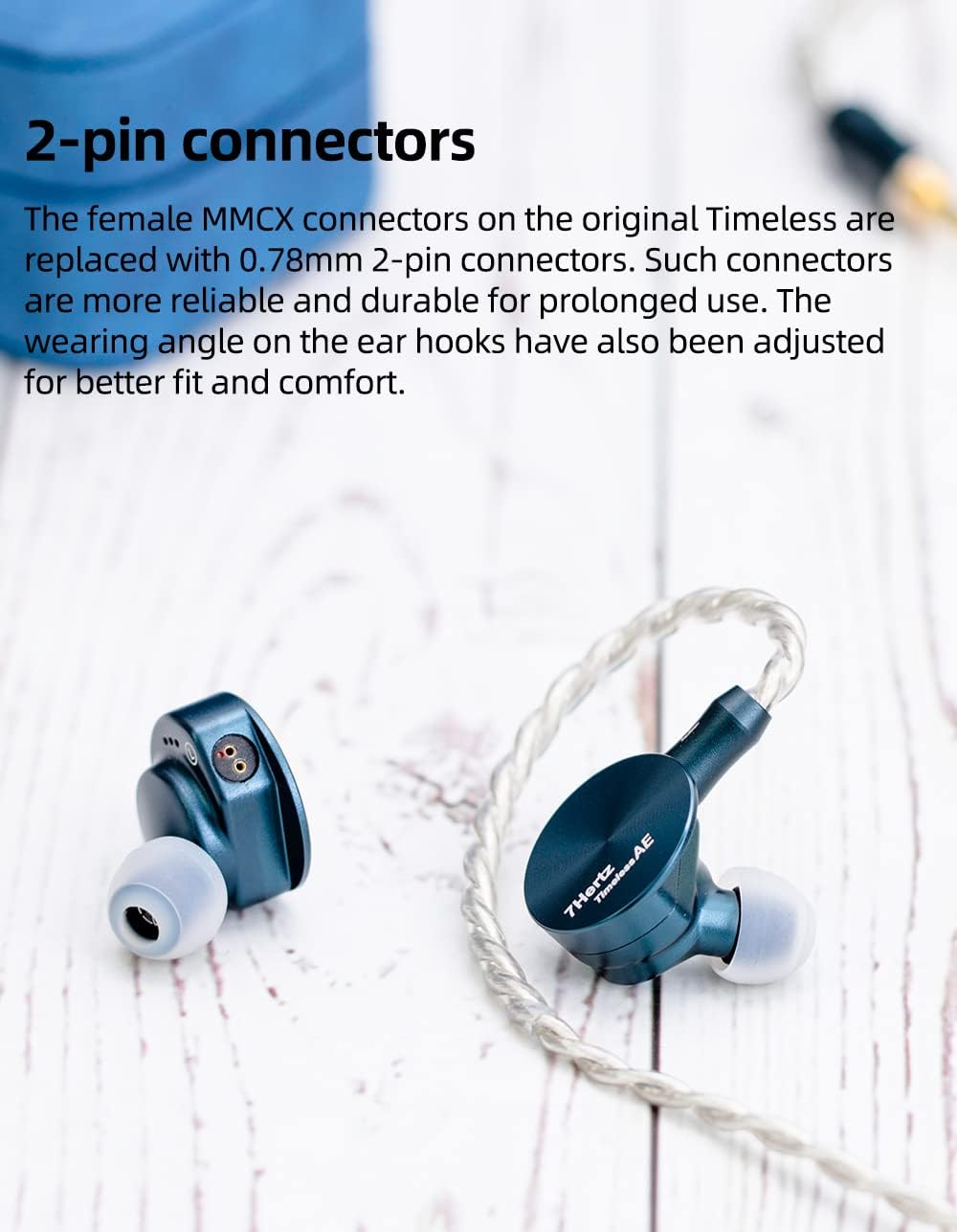 Close-up of Linsoul 7HZ Timeless AE earphones showing the 2-pin cable connectors
