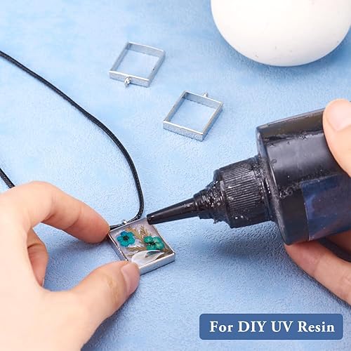 Vista 43 de Dijes de bisel de espalda abierta de estilo surtido, colgantes de marco hueco de metal, dijes de flores prensadas para hacer joyas de resina UV DIY