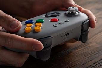 وحدة تحكم بلوتوث 8BitDo 64 للرسومات التناظرية ثلاثية الأبعاد، وSwitch، وSwitch 2، وWindows، وAndroid (رمادي)