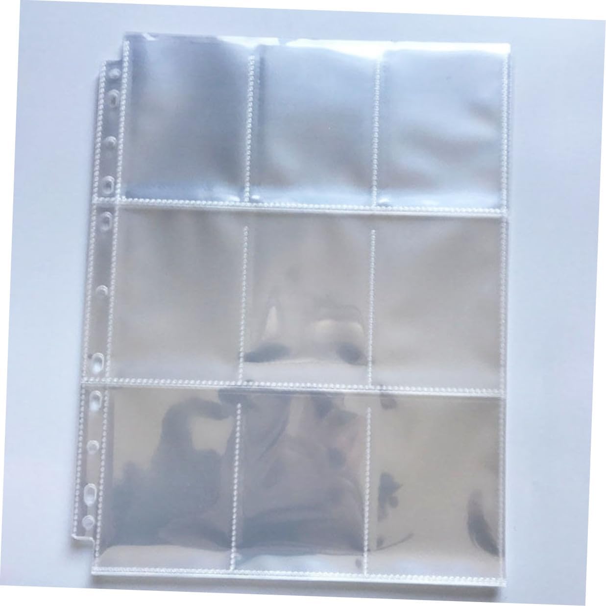 50pcs 9-Pocket Photo Album Sleeves A4 Size Plastic Binder Pockets for 3-inch Photos, Loose Leaf Trading Card Storage Pages Compatible with 3-Ring Binders