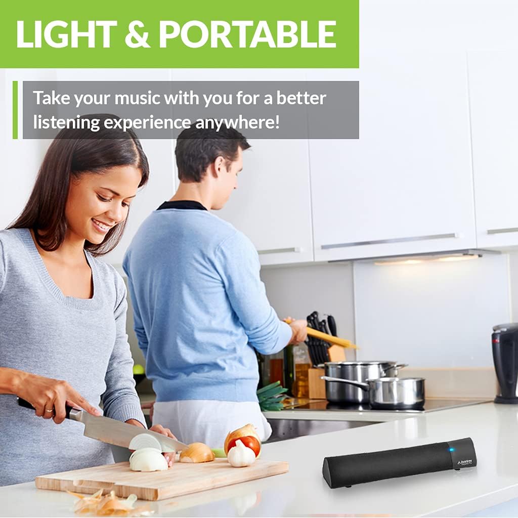 Person using Avantree Torpedo Plus speaker in a kitchen environment.