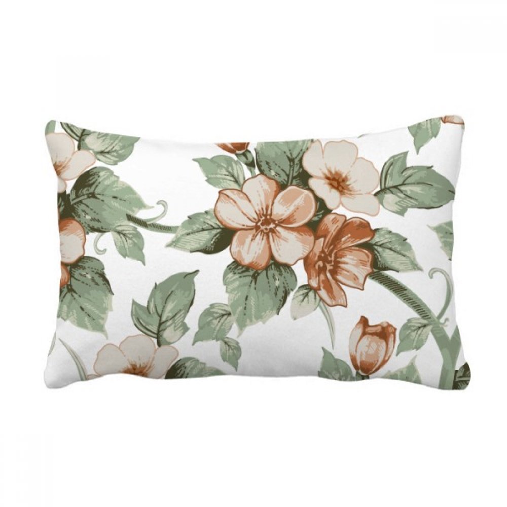 Décoration canapé avec le coussin fleurs en rotin élégant