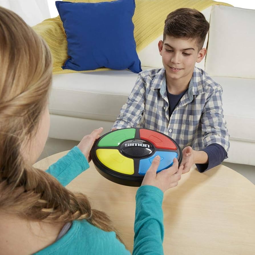 ハズブロ ゲーム Simon Optix 海外 おもちゃ 記憶 リズム 脳トレ Amazon.com: Simon Electronic Memory Game : Toys & Games