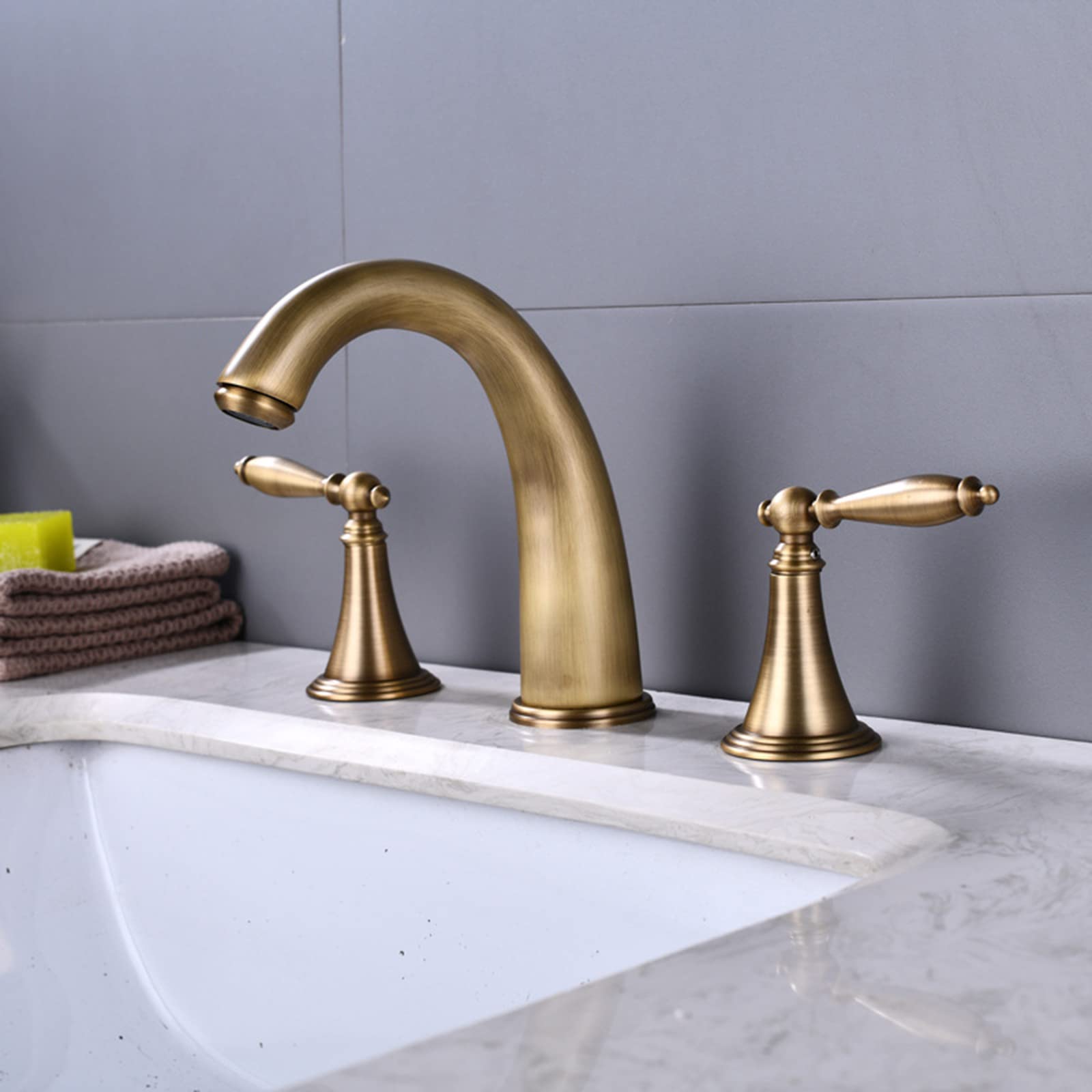 Robinet mitigeur d'évier de lavabo divisé pour une salle de bain rétro chaleureuse