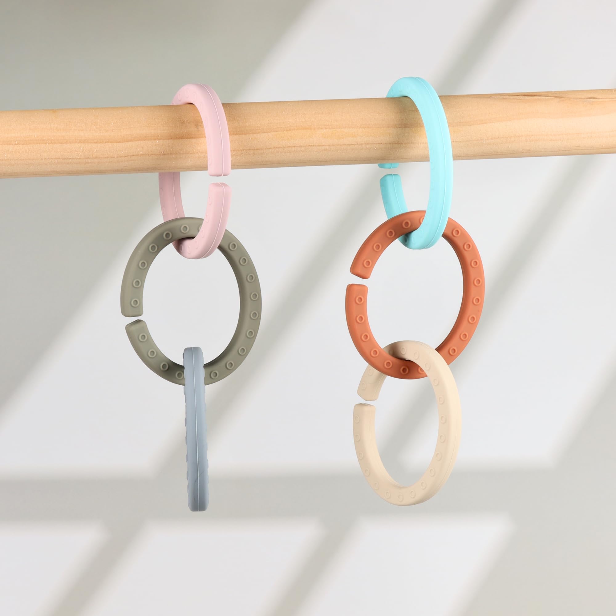 Juego de anillos enlazables para bebé, mordedores de silicona para bebés, se fijan a cochecitos, asientos de coche y más, silicona de grado alimenticio