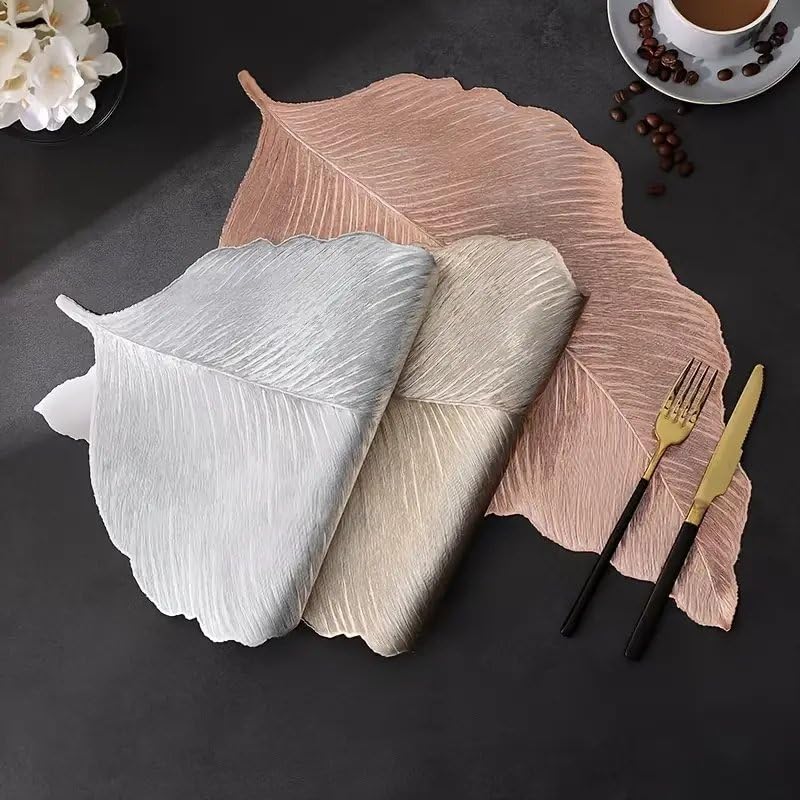 Image of Dakshya Industries PVC Waterproof Leaf Shape Table Placemat Set of 2 - Premium Rose Gold Dining Table Mats | Heat Resistant, Non-Slip, Washable Decorative Table Mat for Kitchen & Dining (Silver)