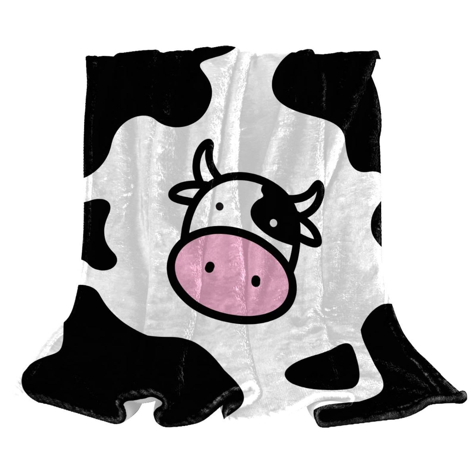 Couverture polaire dessin animé vache pour des soirées cocooning sur le canapé