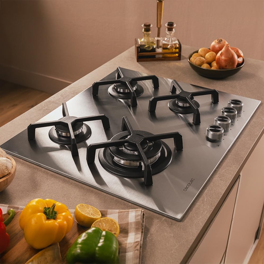 Close-up of a gas burner with blue flame