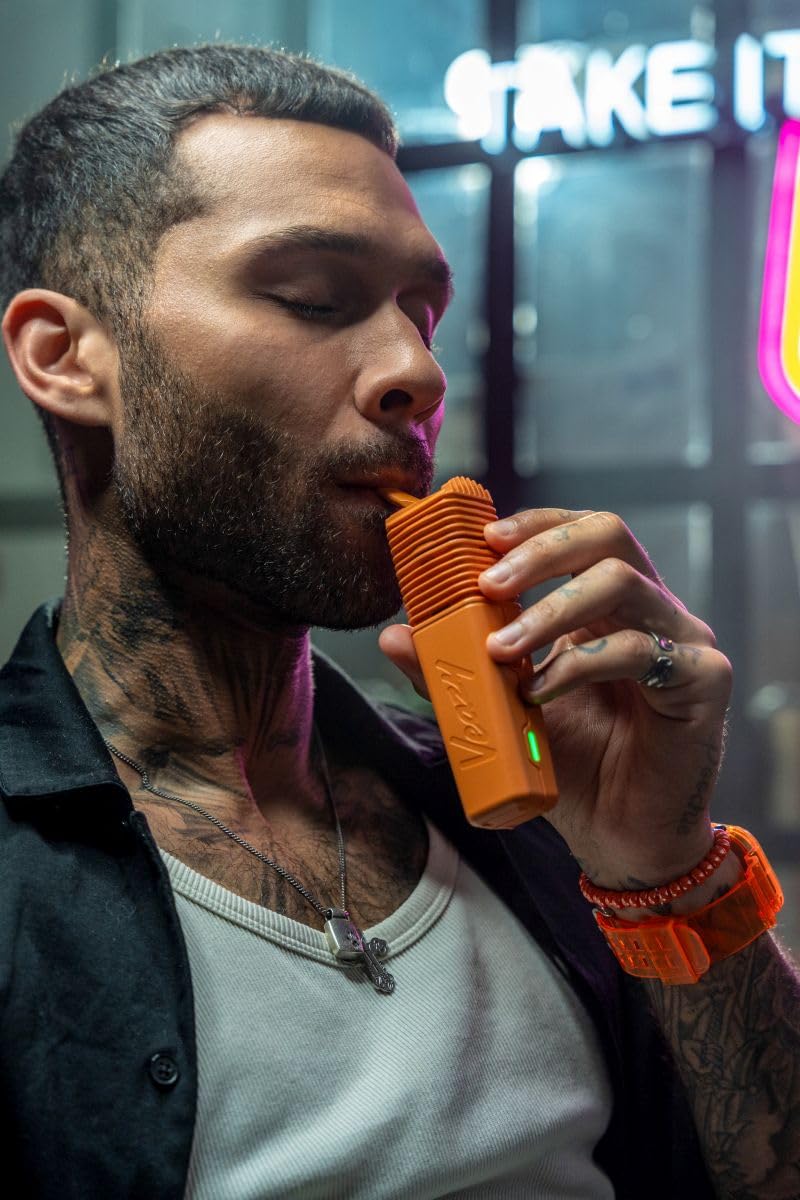 VEAZY Vaporizer von Storz & Bickel – Alluring Black - Kompakter Premium-Kräuterverdampfer (Inspiring Orange)