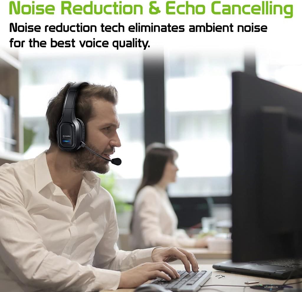 Man wearing Work PRO headset at a desk, demonstrating noise reduction