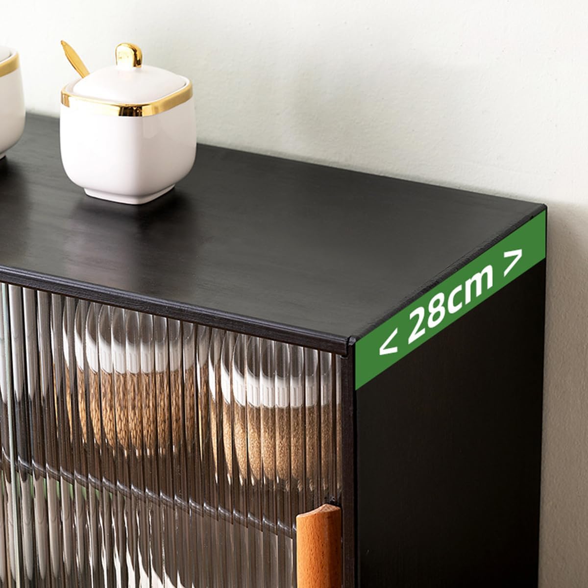 Cabinet in use, storing various kitchen items