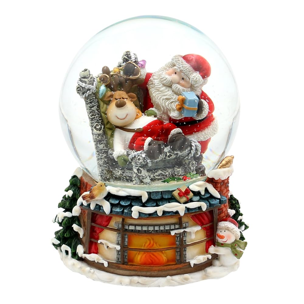 Schneekugel Rentier im Sessel und Weihnachtsmann, auf Kamin Sockel, mit Spielwerk, Melodie: Here Comes Santa Claus, L/B/H/Ø Kugel 11 x 11 x 15 cm Ø 10 cm.
