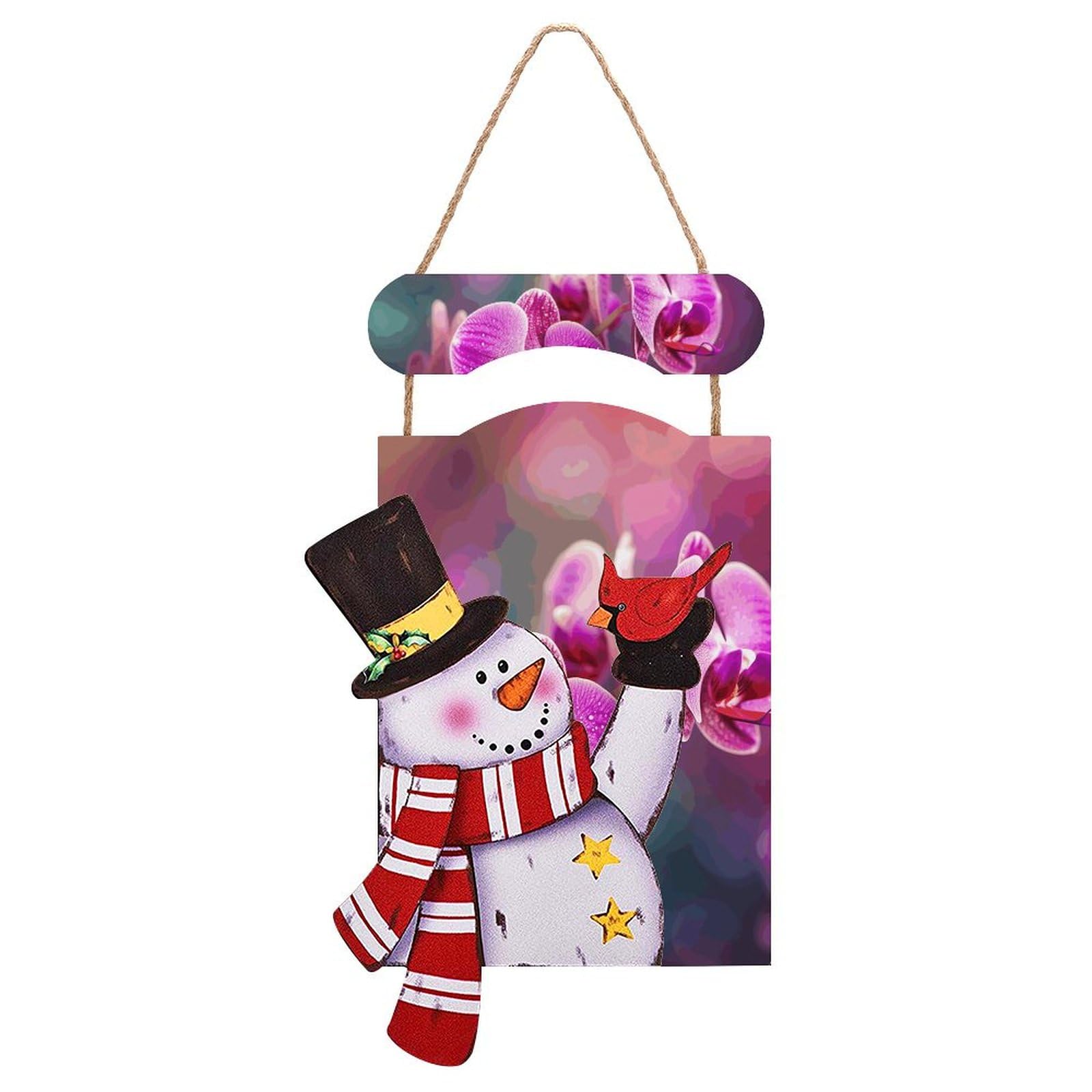 Bonhomme de neige en bois de Noël et sa belle fleur de décoration