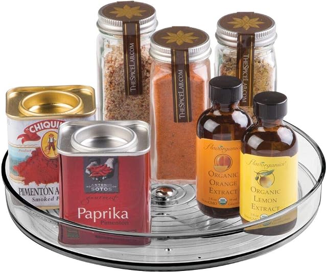 mDesign Rotatable Spice Rack  Stylish Spice Stand for Pepper, Baking Ingredients and Preserves  Round Kitchen Shelf for Sideboard and Kitchen Cupboard  Smoke Grey