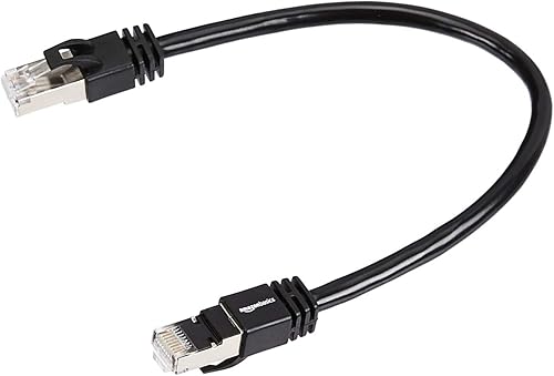 Tienda Basics Cable de conexión Ethernet Gigabit RJ45 Cat 7 de alta velocidad, 10 Gbps, 600 MHz, negro, 1 pie, paquete de 5