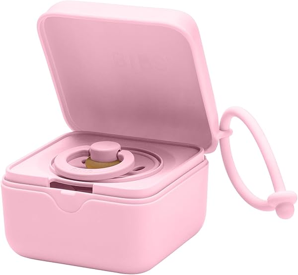 Close-up of the BIBS Pacifier Box in Baby Pink, showing its compact design and strap attachment.
