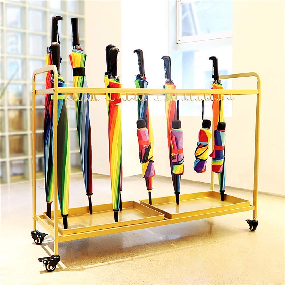 Porte-parapluie de luxe en métal doré design pour hall d'accueil chic