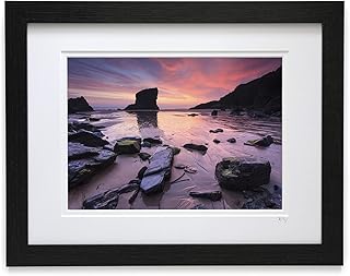Mounted or framed photograph by Andrew Ray featuring sunset at the Bedruthan Steps in Cornwall.
