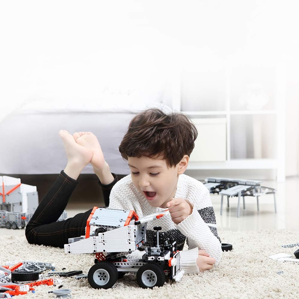 Child playing with the assembled truck model