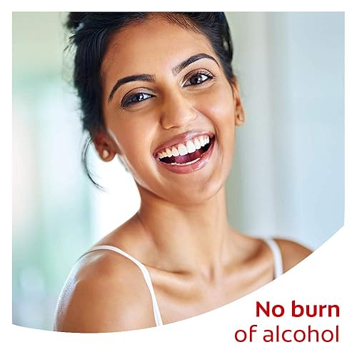 Miniatura 4 de Colgate Enjuague bucal blanco óptico blanqueador, menta fresca - 16.0 fl oz, 16 onzas líquidas