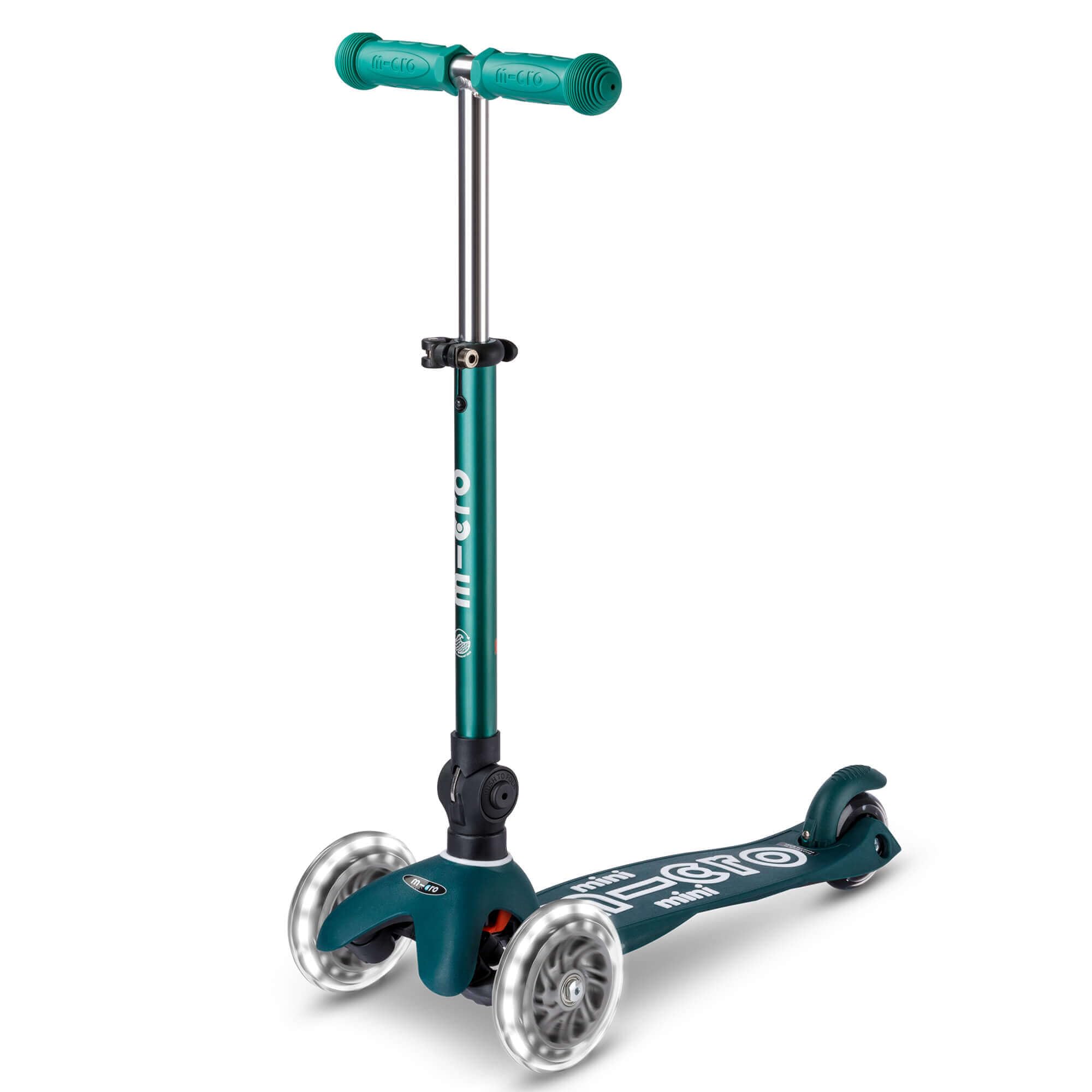 Micro Scooters | Mini Micro Deluxe LED Eco Children's Scooter | Handlebar Adjustable & Foldable | Extra Grippy Deck | Light Up Wheels | 2-5yrs | Boys & Girls | Eco Green