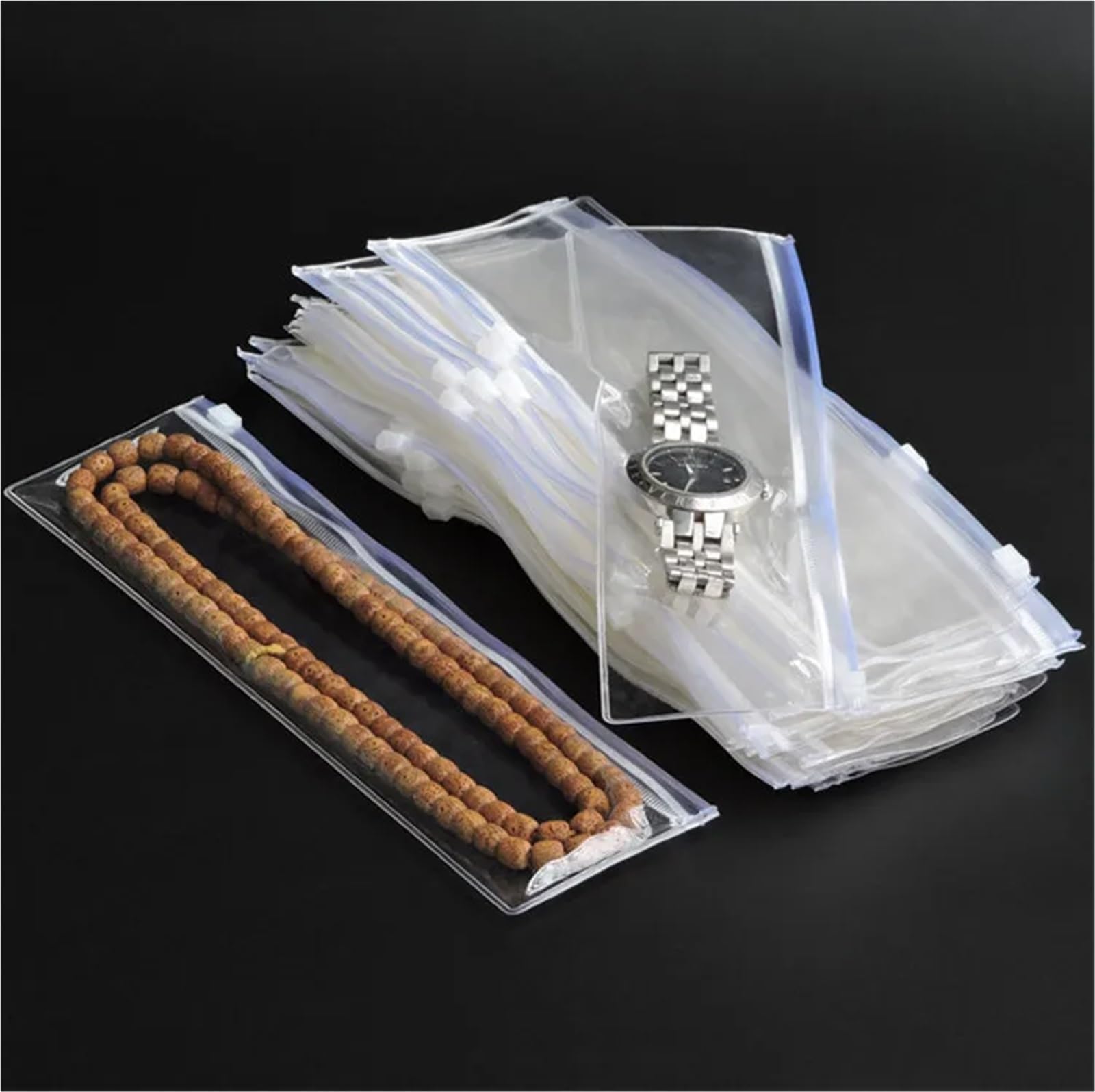 Lot de 200 sacs d'emballage longs en plastique PVC transparent pour bijoux, colliers, bracelets et montres - Anti-poussière et oxydation (A)