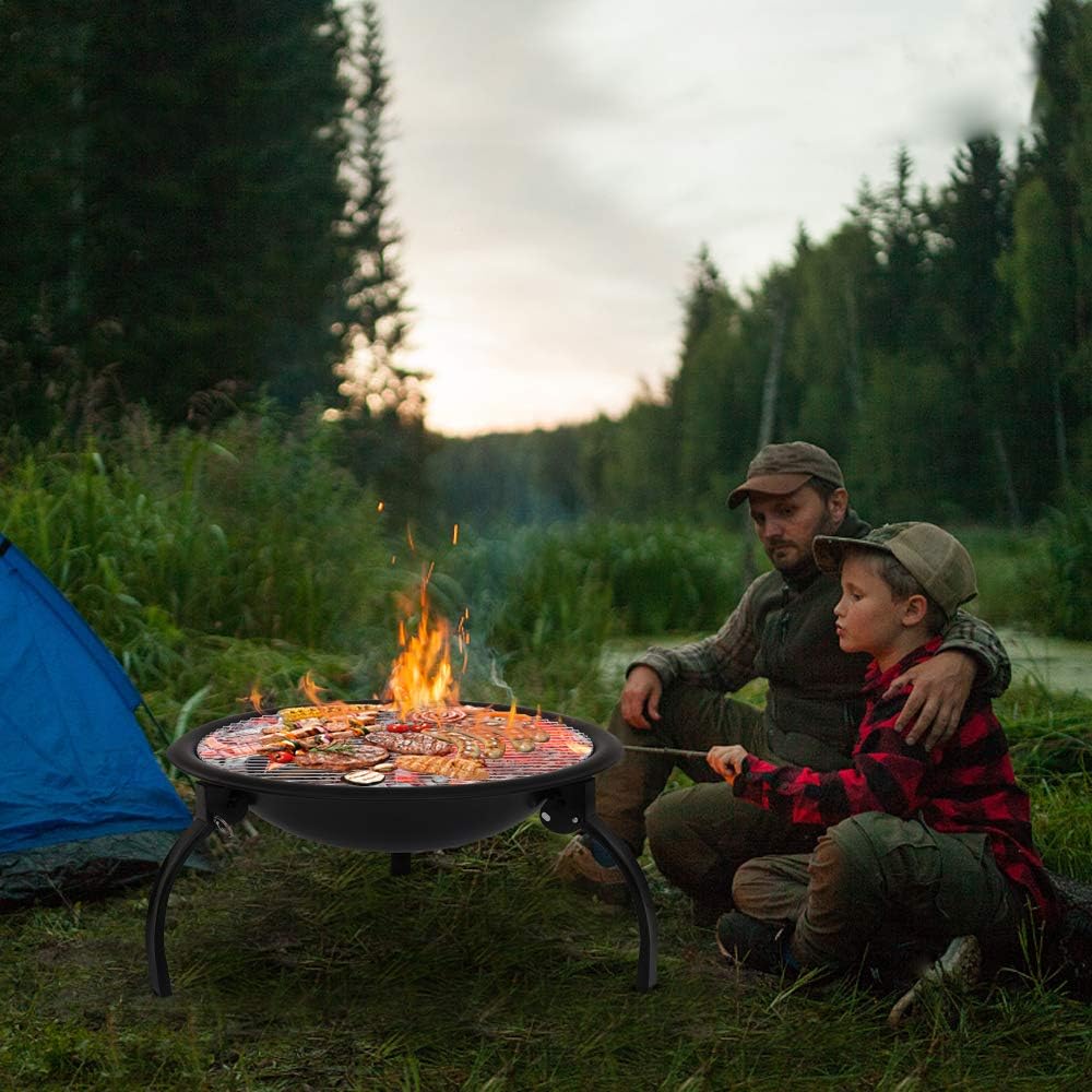Two people grilling on ZOKOP Charcoal Grill in a forest