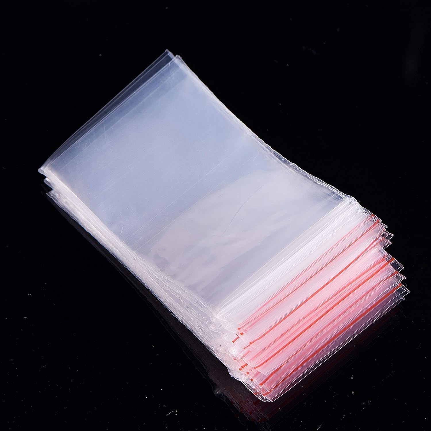 100Pcs 1.5"x2.5" Small Clear Plastic Bags, Reclosable Zip Seal Lock Bags Heavy Duty Mini Zip Bag Resealable Multipurpose Storage Bag for Jewelry, Bead Crafts Small Parts Storage (1.5"x2.5" 100pcs)