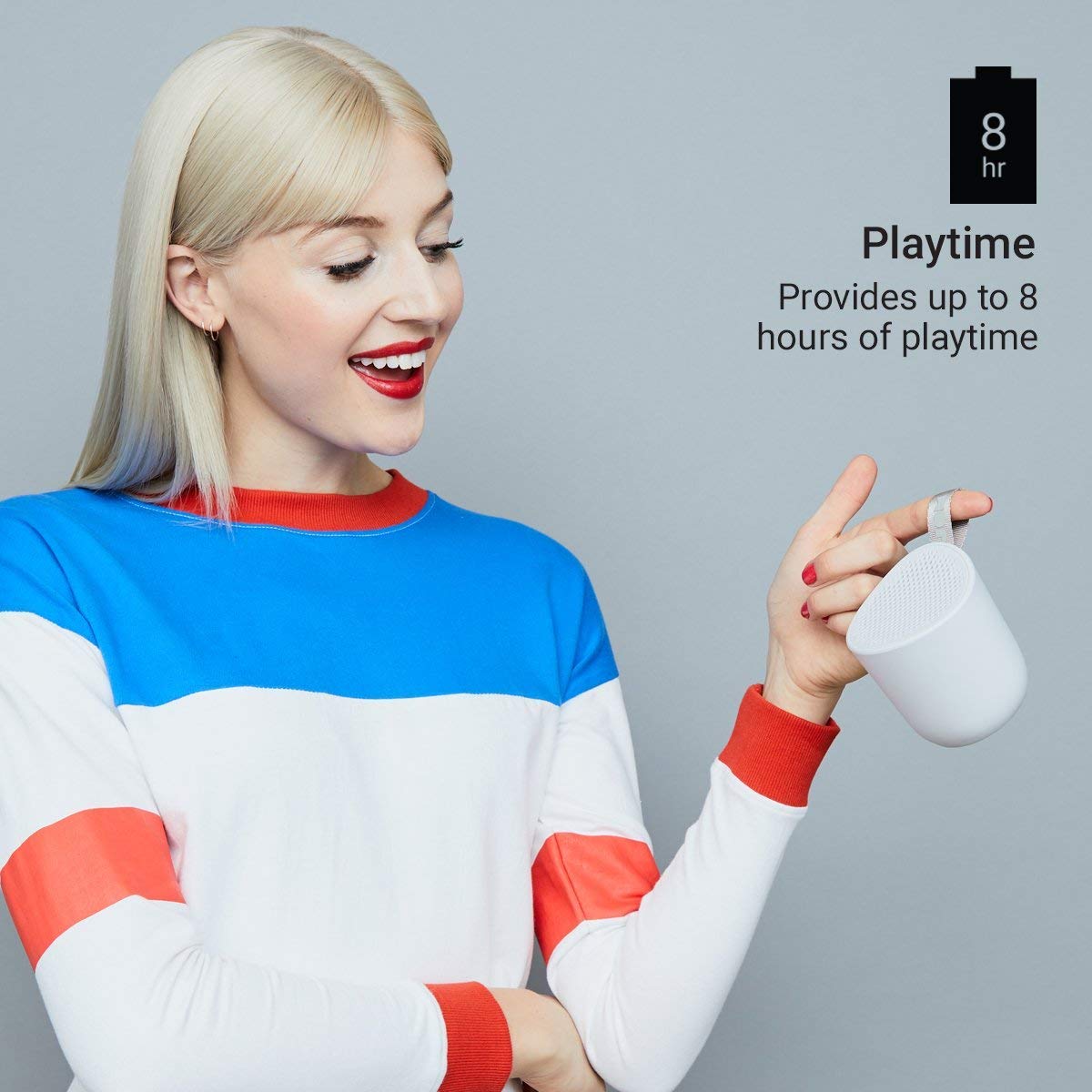 Person holding the Jam Chill Out speaker, with an icon indicating up to 8 hours of playtime.