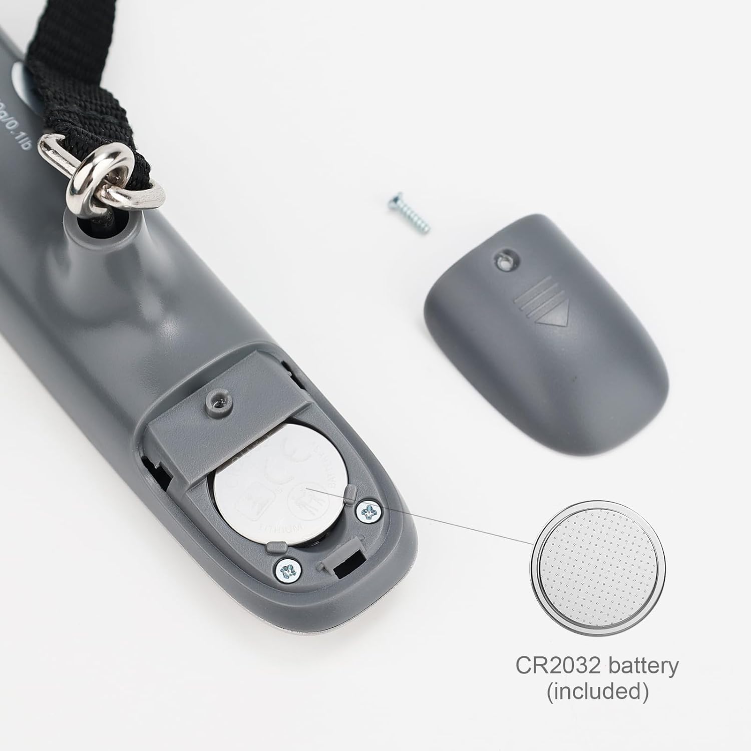 Close-up of the GRIFEMA GA2006 Digital Luggage Scale's battery compartment with a CR2032 battery visible