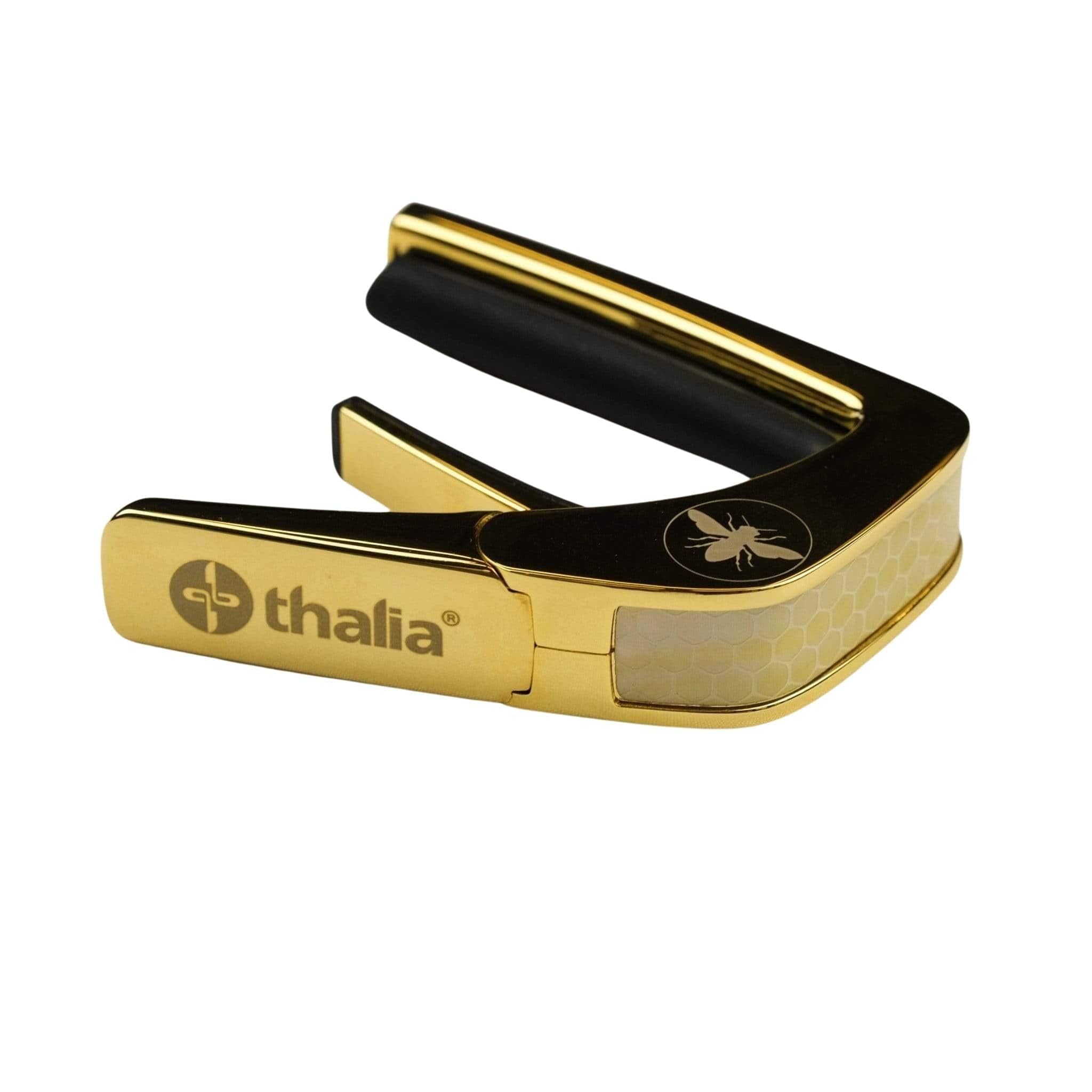 Thalia Premium Series Kapodaster mit Gold-Finish und Vintage Perlmutt Honeycomb Einlage