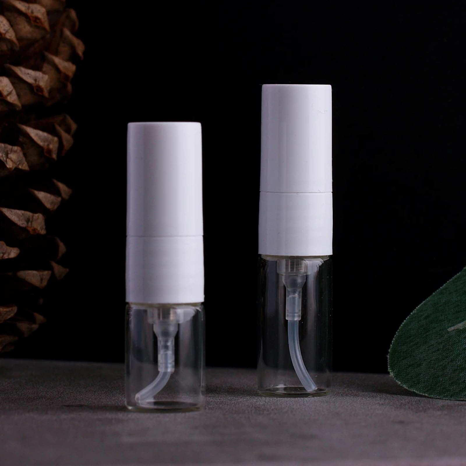 Mini Botella de Perfume de 1/ 2ml, 100 unids/Lote, Botellas vacías rellenables con pulverizador Blanco, envases cosméticos, atomizador portátil