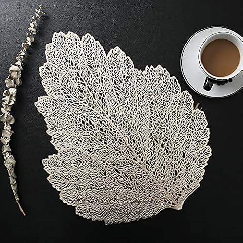 XIANGYUNLAI Leaves Placemats for Dinner Table 18.5X14 Inch Metallic Hollow Out Large Leaves Pressed Vinyl Place Mats for Holiday Party Wedding Accent Centerpiece Dinner Table Decoration,Gold,Set of 9 Cover
