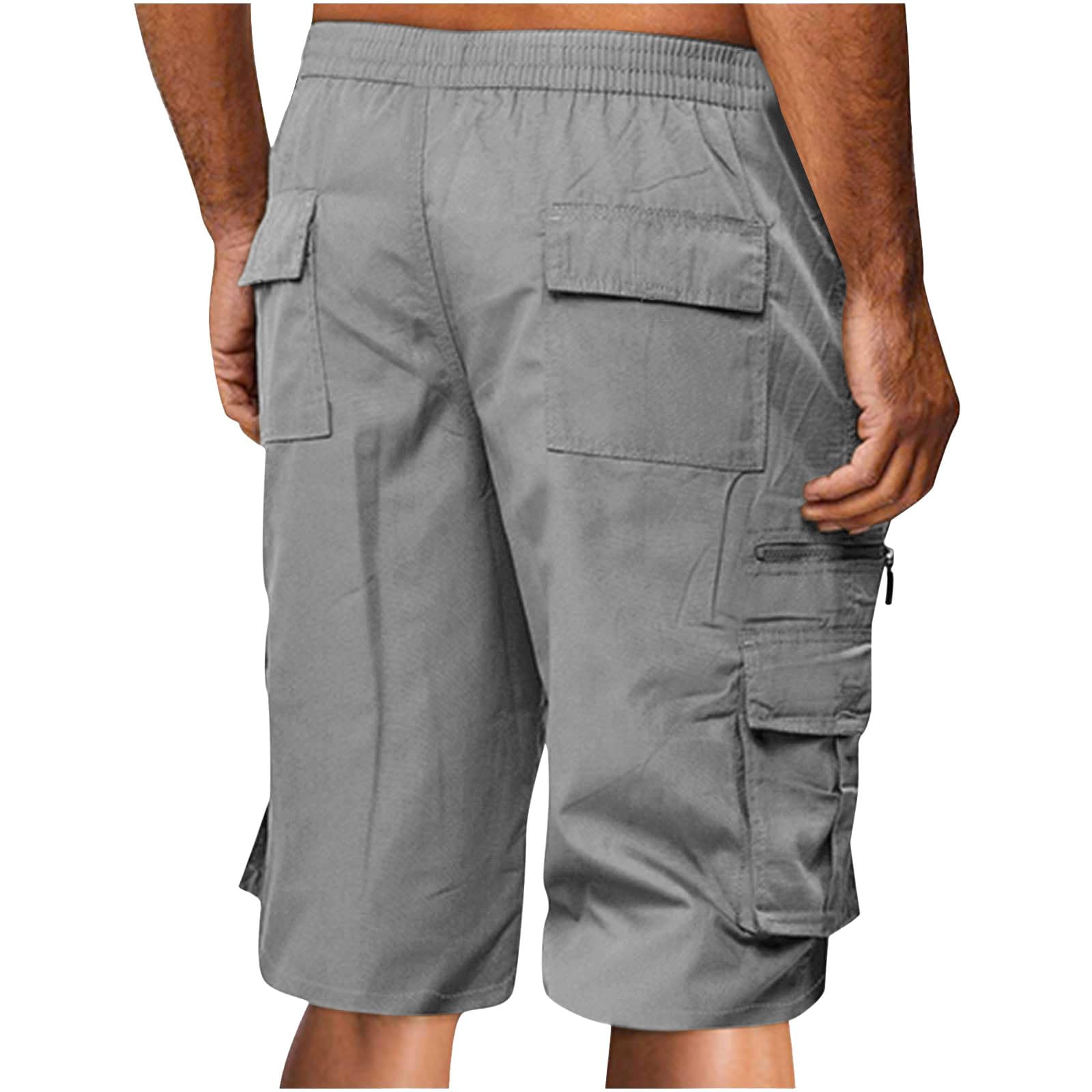 Short cargo pour homme avec plusieurs poches, taille élastique, cordon de serrage, couleur unie, longueur genou, design décontracté athlétique pour un usage quotidien, l'entraînement en plein air